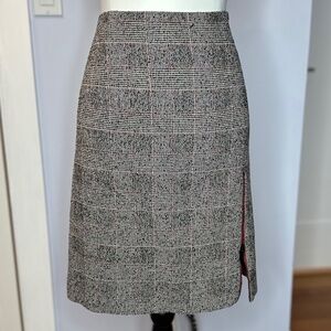 Worth New York; wool blend Glen Plaid knee-length skirt. Front opening. Like new